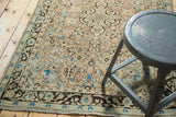 Vintage Sarouk rug border, charcoal brown, sea foam green, and antique ivory floral field.