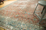 Blush, powder blue floral details, and abrashes on this vintage Mahal carpet.