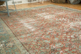Repeating panel design and abrashes on a vintage Mahal rug in ruby blush and pale blue.