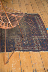 Antique Belouch prayer rug, indigo blue, chocolate brown, apricot geometric pattern, tattered ends.