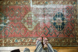 Antique Persian Malayer runner, geometric triple medallion, blush field, serrated leaf border, even wear.