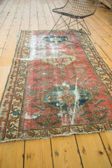 Antique Malayer runner fringe, detailed serrated leaf and pawn design borders with time-softened tones.