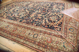 Intricate antique Mahal carpet corner: Mustafi design field, dense floral and vine borders.
