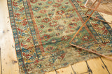 Detail of the storied wear and tattered end on an antique Caucasian collector's rug.