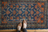 Vintage Hamadan rug: allover germinating plant design in cobalt blue and terra cotta.