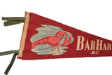Vintage felt pennant's left side: red lobster graphic, light blue puddle, green ties.