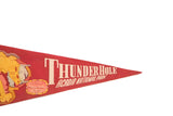 Red felt pennant with 'Thunder Hole Acadia National Park' text and map of Mount Desert Island.