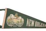 Vintage green felt New Orleans pennant, Jackson Statue illustration, partial white lettering, cream binding.