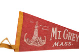 Red felt vintage pennant close-up: War Memorial Beacon graphic and yellow header.