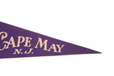 Vintage purple felt pennant featuring cream 