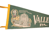 Vintage green felt flag showing Washington bust, laurel wreath, and chapel graphic.