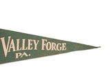 Green felt pennant showing 