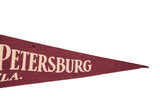 Burgundy vintage felt pennant tip with cream 'Petersburg Fla.' lettering and small pinhole.