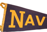 Bold yellow 'NAV' letters and yellow loop on vintage navy felt pennant.