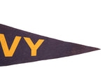 Yellow 'VY' letters and worn tip of the vintage navy felt pennant.