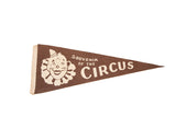 Vintage brown felt Souvenir of the Circus pennant with smiling clown, 10x27 inches.