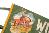 Upper-left detail of the vintage green felt flag, showing a cowboy on a bucking horse and yellow trim.