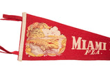 Red felt flag with vintage yellow alligator graphic and 'Miami Fla.' lettering.