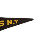 Close-up of the antique felt flag's tip, showing its texture and slightly uneven edge.
