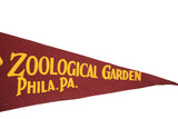 Vintage maroon felt flag displaying yellow Zoological Garden Phila. PA. lettering.