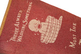 Antique red felt flag close-up, crying baby in bucket with 