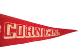 Bold off-white block lettering on the vintage red felt Cornell University flag.