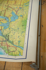 Vintage Rand McNally USA map detail: Great Lakes region, Quebec, and metal roller.