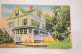 Angled view of the vintage postcard showing the Belvedere Manor in Catskill.