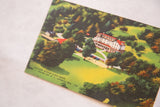 Angled view of a vintage color postcard showing the Winter Clove House in the Catskills.