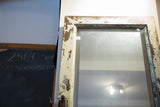 Reclaimed Copper Door Mirror with distressed white paint flaking off and scratched glass.