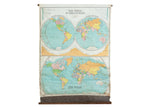 Antique Nystrom The World In Hemispheres map, pastel continents, light blue oceans, bottom damage, 43x54.