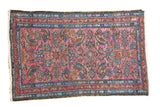Vintage Persian Lilihan rug, circa 1920s, fuchsia field with blue herati motif and red borders.