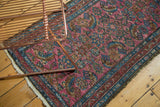 Fuchsia and sky blue Herati motif with even pile wear on a vintage Lilihan rug.