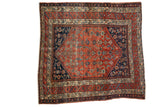 Fine antique Malayer square rug, brick red field, indigo diamond, and herati motifs.