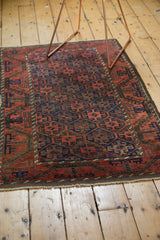 Original secured fringe and side selvage of the antique Belouch rug.