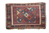 Antique Jaff Kurd Bag Face rug, gul and latch patterns in indigo blue and madder red.