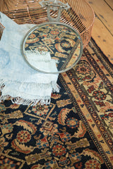 Vintage Malayer rug's intricate Herati motif in dark indigo and contrasting beige border.