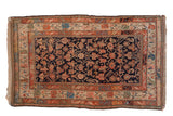 Vintage Kurdish rug, indigo blue field featuring Herati-style animals, terracotta borders. 4'1