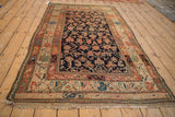 Vintage Kurdish rug upper right detail: charming pictorial motifs in soft terracotta and indigo.