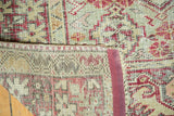 Hand-knotted foundation and red, green, ivory geometric pattern on a vintage Anatolian rug.
