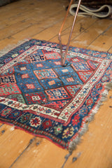 Fringed edge and geometric border of the antique Jaff Kurd rug, showcasing gem-toned lattice panels.