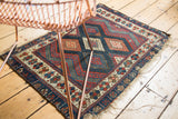 Antique Jaff Kurd rug corner with uncommon lattice diamond panels, floral border, and rustic fringe.