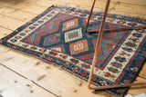 Antique Jaff Kurd rug's uncommon lattice diamond panels and zig-zag borders, madder red, ivory, indigo.