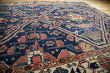Fine Malayer rug's intricate indigo, terracotta, ivory rectilinear patterns, subtle pile wear.