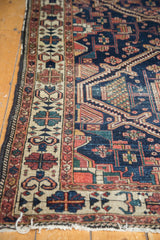 Fine Malayer rug border with rectilinear patterns, scalloped contouring, and tattered side.