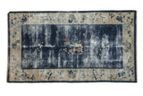 Antique Chinese Peking rug, cobalt blue pictorial field, ivory floral border, showing even wear.