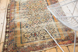 Antique Shirvan rug with Marsali lattice design, showing heavy wear and visible foundation.