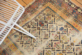 Detail of antique Shirvan fragment, Marsali lattice design in ivory, madder red, sky blue, and exposed foundation.