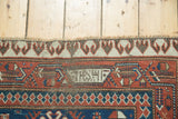 Dated 1903 antique Caucasian rug's Mir Serbend border in madder red and ivory.