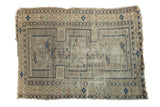 Antique Caucasian pictorial rug, geometric pattern, finned animals, aged ivory, navy, copper green.